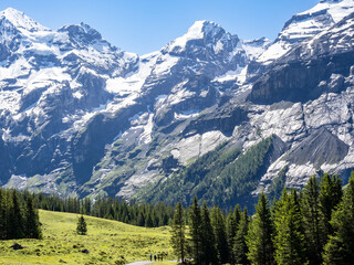 Oeschinen lake hike and surrounding peaks and waterfalls , Switzerland