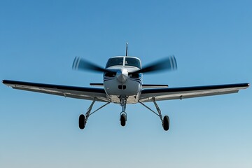 Single-engine plane in flight against clear blue sky