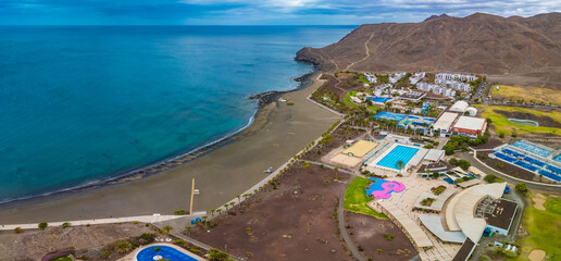 Aerial drone view of Las Playitas fishing town and the beach, Fuerteventura, Canary Islands