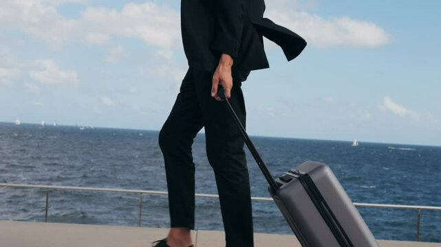 Tourist man with suitcase baggage in spain, A traveler with luggage suit jacket on business street go to a hotel, business office, airport terminal, enjoying the vibrant atmosphere