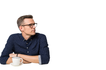 Thoughtful Man in Glasses Looking Away While Holding Coffee Cup