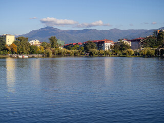 Lake in the mountainous area. Lake Nurigel in Batumi. Water surface, against the backdrop of the mountain.