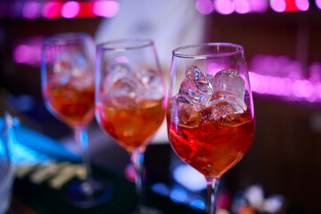 Refreshing and Exquisite Cocktails Being Expertly Poured at a Trendy Bar Environment