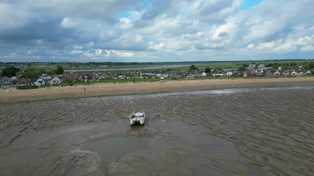 Beautiful High Angle Footage of Beach and Ocean Sea Side at Point Clear Village in Civil Parish of Saint Osyth, County of Essex, England, United Kingdom During Windy and Cloudy Day. May 22nd, 2024