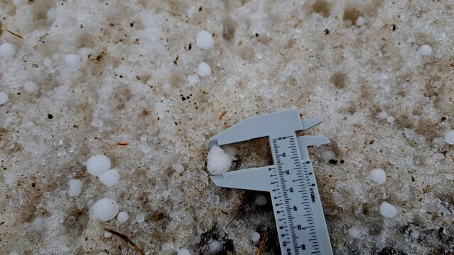 Hailstorm In Ontario, Canada With Snow On Ground