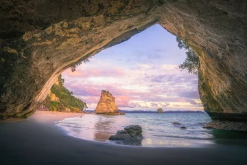 Fotobehang Cathedral Cove view from the cave at cathedral cove beach at sunrise,coromandel,new zealand  © Christian B.