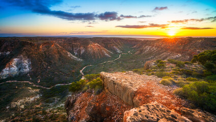 panorama view of sunrise over charles knife canyon, western australia