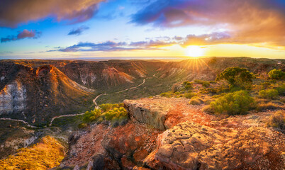 panorama view of sunrise over charles knife canyon, western australia