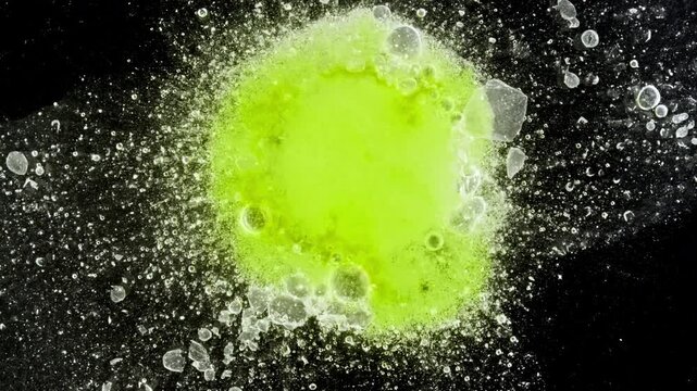 Close-up effervescent tablet vitamin, white pill dissolves with bubbles, round bubbling aspirin in water, slow motion. High quality 4k footage