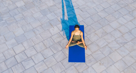 Pensive female enjoying yoga