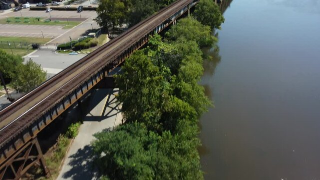 James River drone footage panning up to downtown richmond
