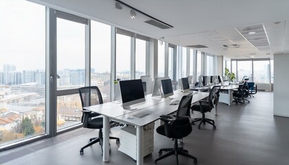 White coworking interior with tables and pc computers, panoramic window