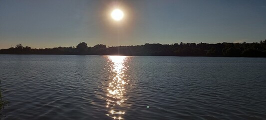 Fototapeta premium sunset over lake