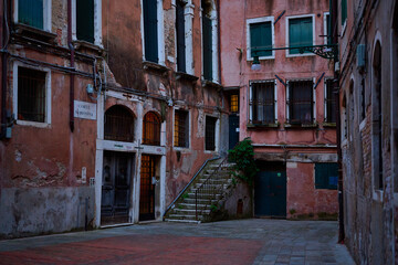 Venice and its canals ,boats,sculptures and birds