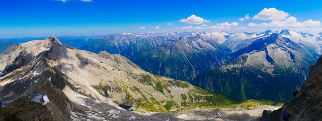 Fototapeta premium View on jagged mountains and glaciers of Zillertal alps on a summer day