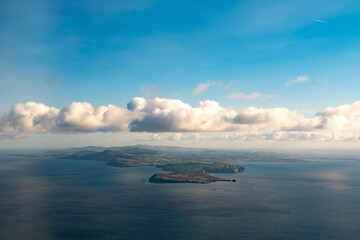 Aerial view looking up the Isle of Man from the south with scenic coastline and clouds - Landscape