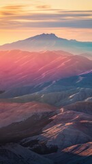 Fototapeta premium Scenic Mountain Sunrise with Pink, Purple, and Orange Sky