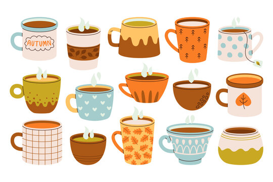 Ceramic cups, porcelain mugs with seasonal autumn aromatic coffee or tea hot steaming drinks set