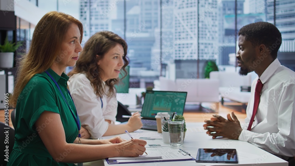 Poster hr recruiters interviewing a job seeker and taking notes during meeting, attending an interview and 