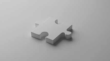 Obraz premium A single white puzzle piece on a white background.