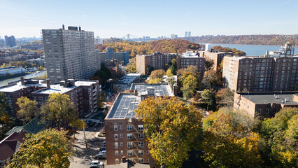 This location in the Bronx offers stunning views of lush greenery, a picturesque lake, and urban structures. Framed by the river, it showcases iconic bridges and the New York City skyline 