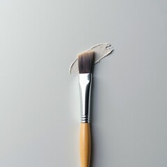 Makeup brush with foundation smear - ideal for beauty blogs, cosmetic websites, makeup tutorials, and professional artist portfolios