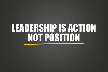 Leadership is action, not position. A blackboard with white text. Illustration with grunge text style. © lhphotos