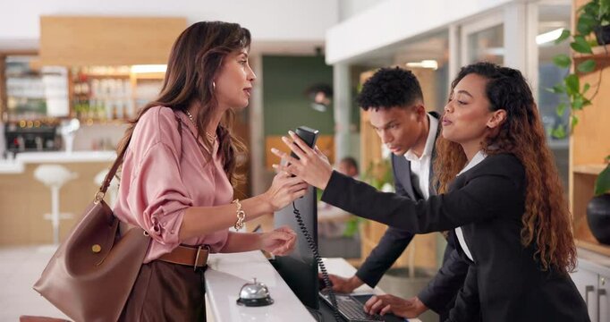 Woman, concierge and angry with dispute, mistake and drama in hotel lobby. Frustrated, customer and manager with argument, angry and fight with schedule issue or booking crisis and upset with service