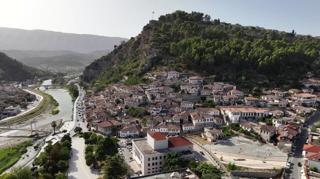Aerial Drone Shot of Berat city in Albania in a day. Historical oriental houses in the old city of Berat in Summer