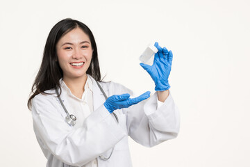Asian woman doctor holding liquid base cytology set isolated on white background.Gynecologist...