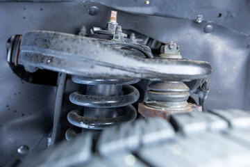 High quality underneath springs, shocks, axles photo of a Regular Cab  Japanese American pickup truck 4x4 off-road SUV vehicle 