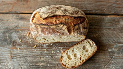 Top View of Homemade Sourdough Bread on a Rustic Wooden Table