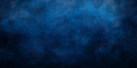 Fototapeta premium Dark blue grunge textured background creating dramatic atmosphere