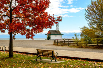 Kew Beach and the Leuty Lifeguard Station in the Toronto Beaches with wooden boardwalk and park...