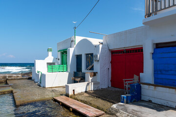 Typical colorful houses marina of Mandrakia, Milos Island, Cyclades.