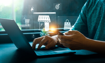 Person Using Smartphone and Laptop for Online Shopping and E-Commerce Management, Featuring Digital...