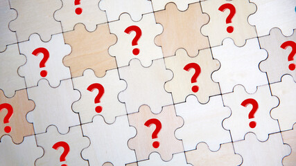 Fototapeta premium question markwooden puzzle with question mark icon and idea. solution concept. Q and A Concept. Idea And no idea. question Mark And idea. problem solving concept. on wall