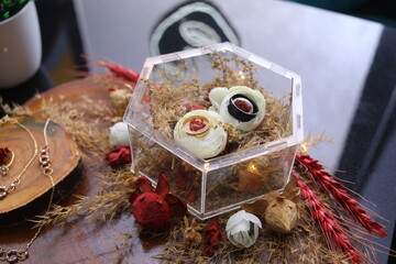 Decorative hexagonal box with dried flowers