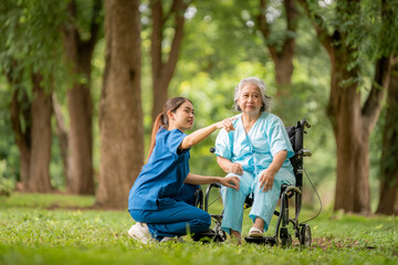 Fototapeta premium Healthcare or physical therapy nurse is helping elderly appears engaged in an exercise routine caregiver individuals focused on rehabilitation exercises elder concept.