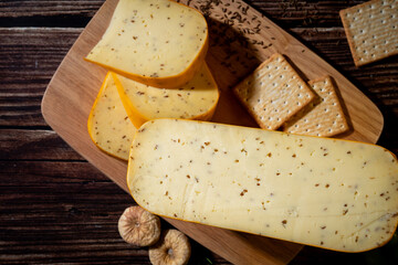 A big block of cheese that everyone likes to eat.