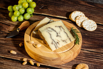 A big block of cheese that everyone likes to eat.