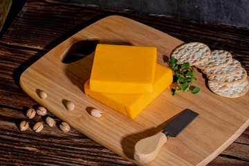 A big block of cheese that everyone likes to eat.