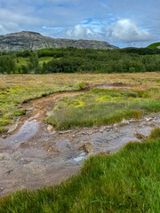 Geysir Geothermal Area, Iceland - August 12, 2024: Landscape formations in the Geysir Geothermal Area in Iceland
