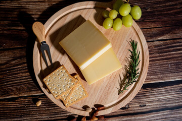 A big block of cheese that everyone likes to eat.