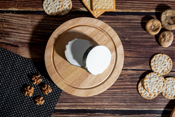 A big block of cheese that everyone likes to eat.