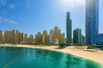 Obraz premium Beautiful view of the Jumeirah beach of Dubai, UAE. JBR beach in sunny day.