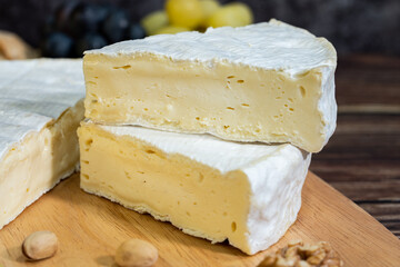 A big block of cheese that everyone likes to eat.