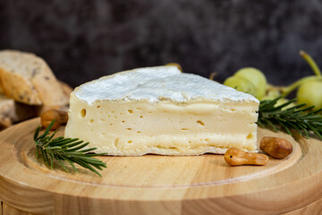 A big block of cheese that everyone likes to eat.