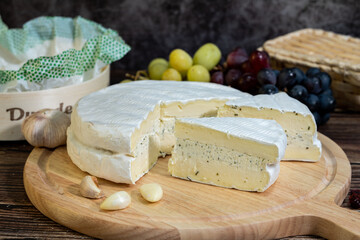 A big block of cheese that everyone likes to eat.