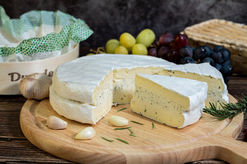 A big block of cheese that everyone likes to eat.